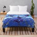 Colorful plush blanket with abstract floral and nature-inspired patterns