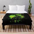 Plush blanket with colorful retro gaming inspired pattern