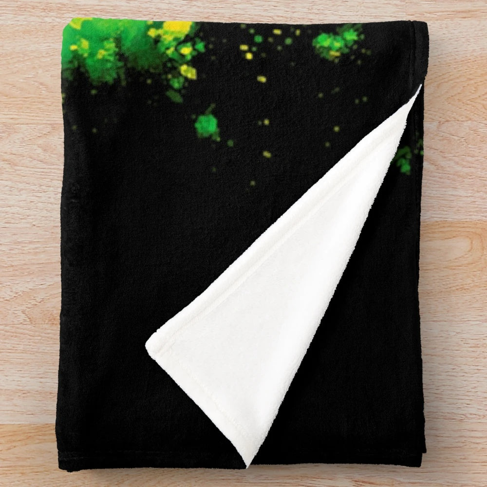 Plush blanket with colorful retro gaming inspired pattern