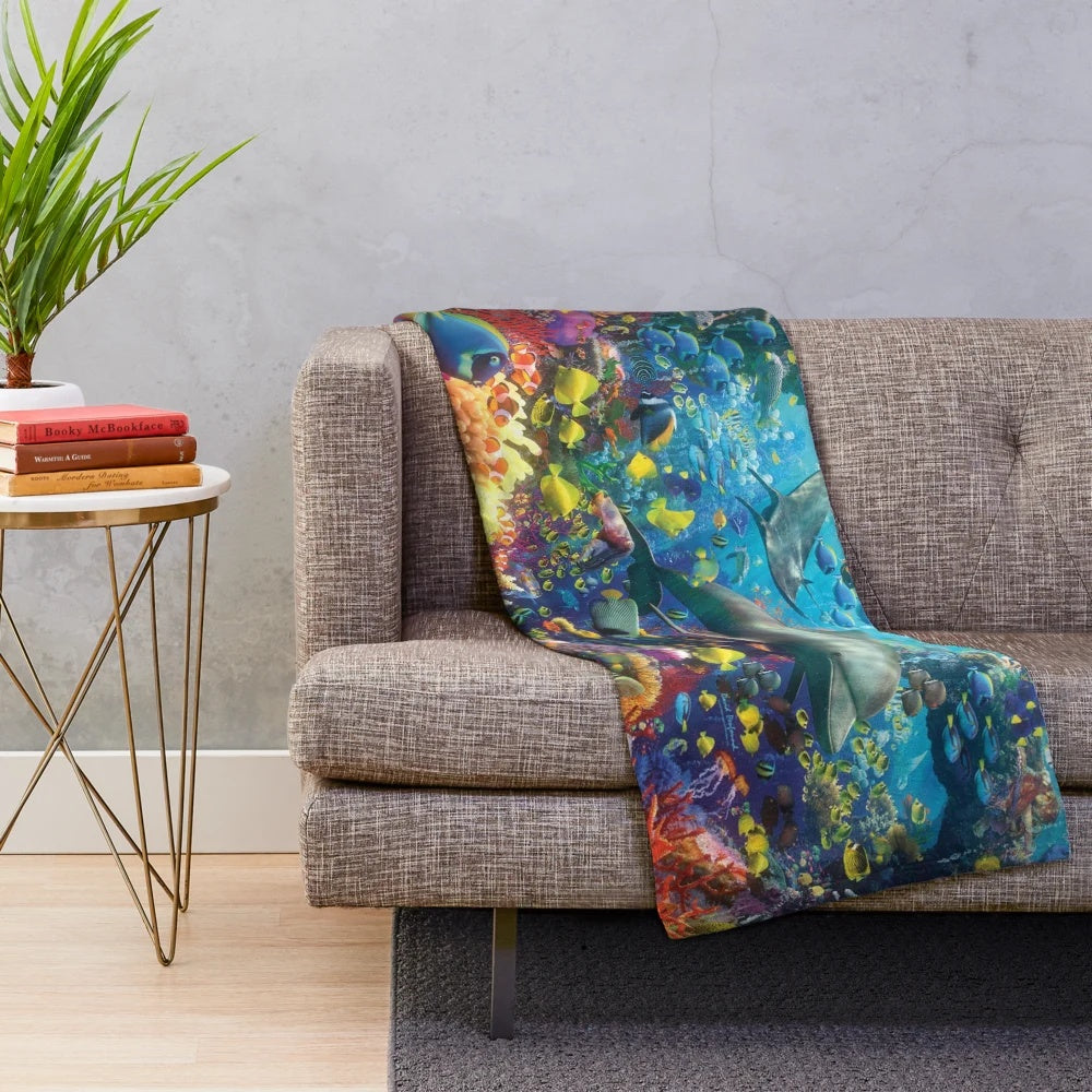 Plush blanket featuring a colorful underwater seascape with marine life