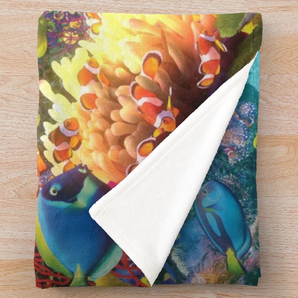 Plush blanket featuring a colorful underwater seascape with marine life