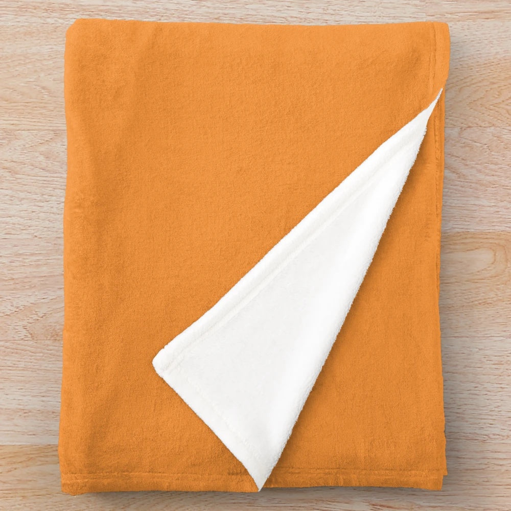 Warm orange watercolor flowers on a cozy plush blanket