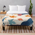 Cozy plush blanket with abstract autumn leaves and whimsical fall pattern