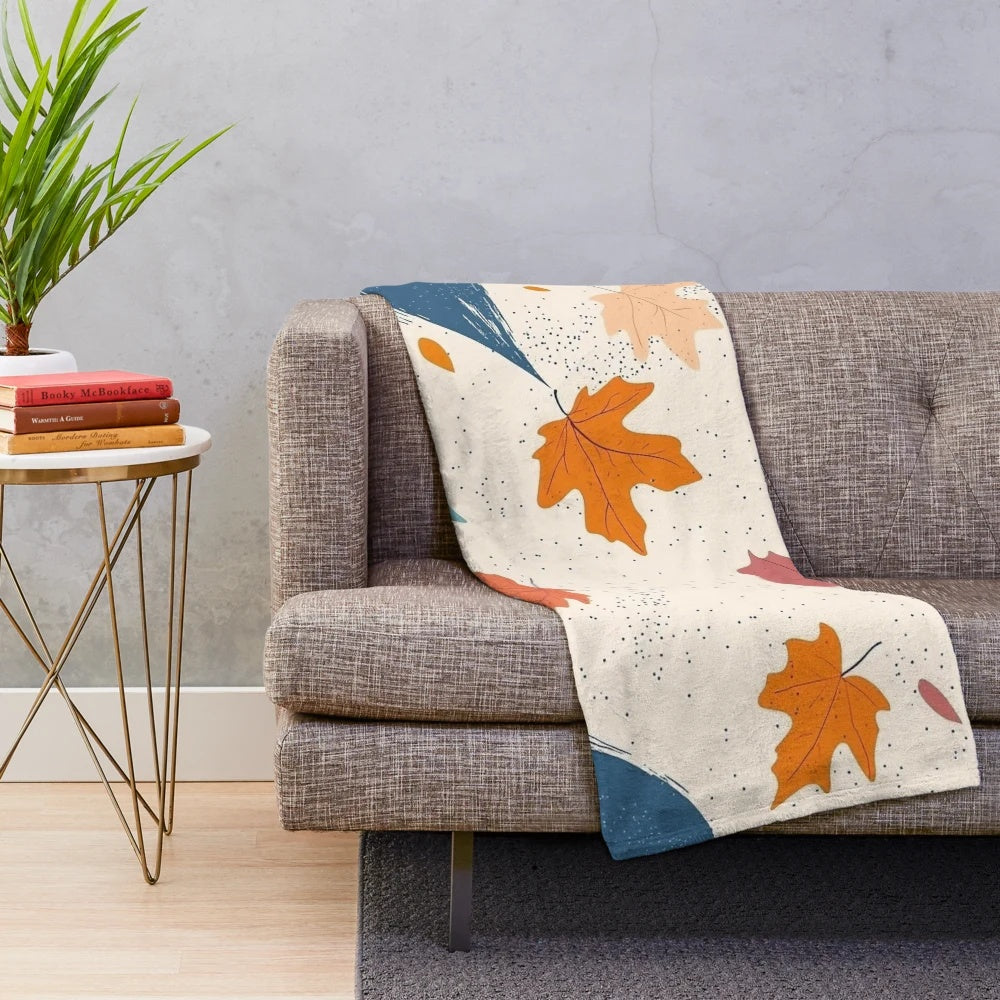 Cozy plush blanket with abstract autumn leaves and whimsical fall pattern