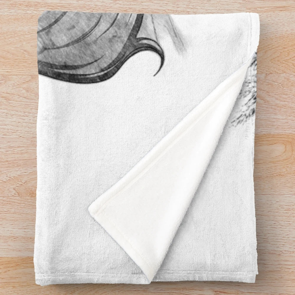 Plush blanket with nature-inspired motifs like sunflowers and berries