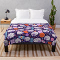 Soft and plush blanket featuring a woolly sheep and knitting design