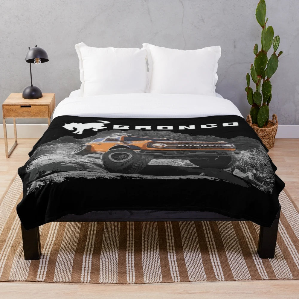 Plush blanket featuring Ford Bronco design