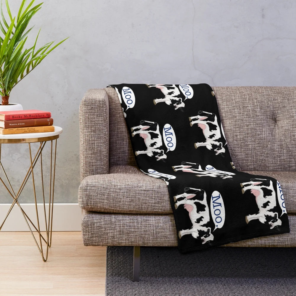 Soft plush cow print blanket for cozy home decor