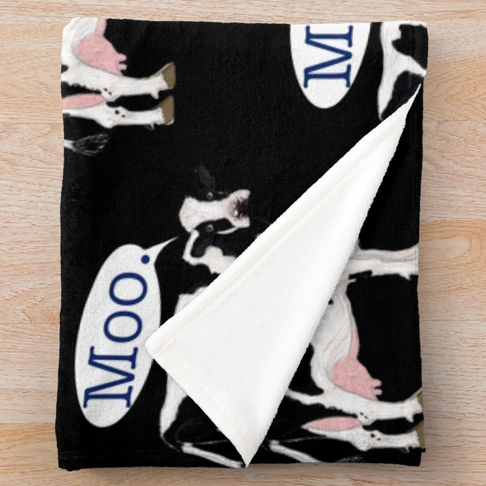 Soft plush cow print blanket for cozy home decor