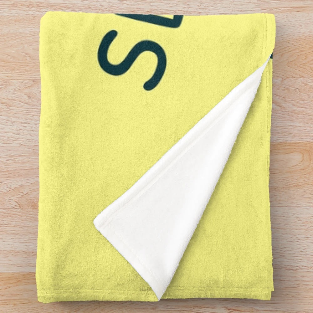 A soft, plush dinosaur-themed blanket for comfortable and relaxing sleep.
