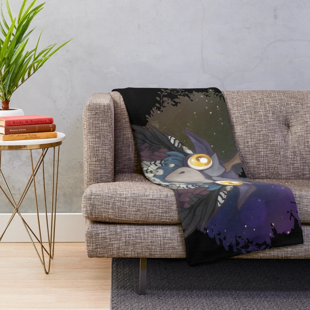 Soft plush druid blanket with cute moonkin mascot design