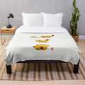 Cozy and soft plush blanket with a fall-themed animal design