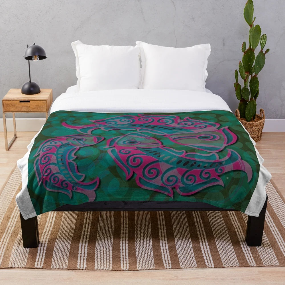 Soft plush blanket with cute fish and Aztec-style pattern