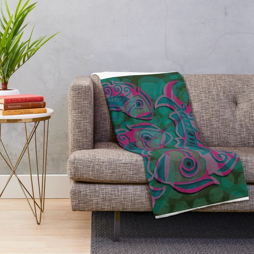 Soft plush blanket with cute fish and Aztec-style pattern