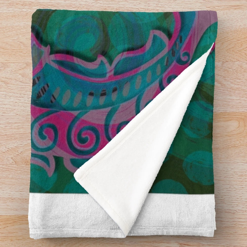 Soft plush blanket with cute fish and Aztec-style pattern