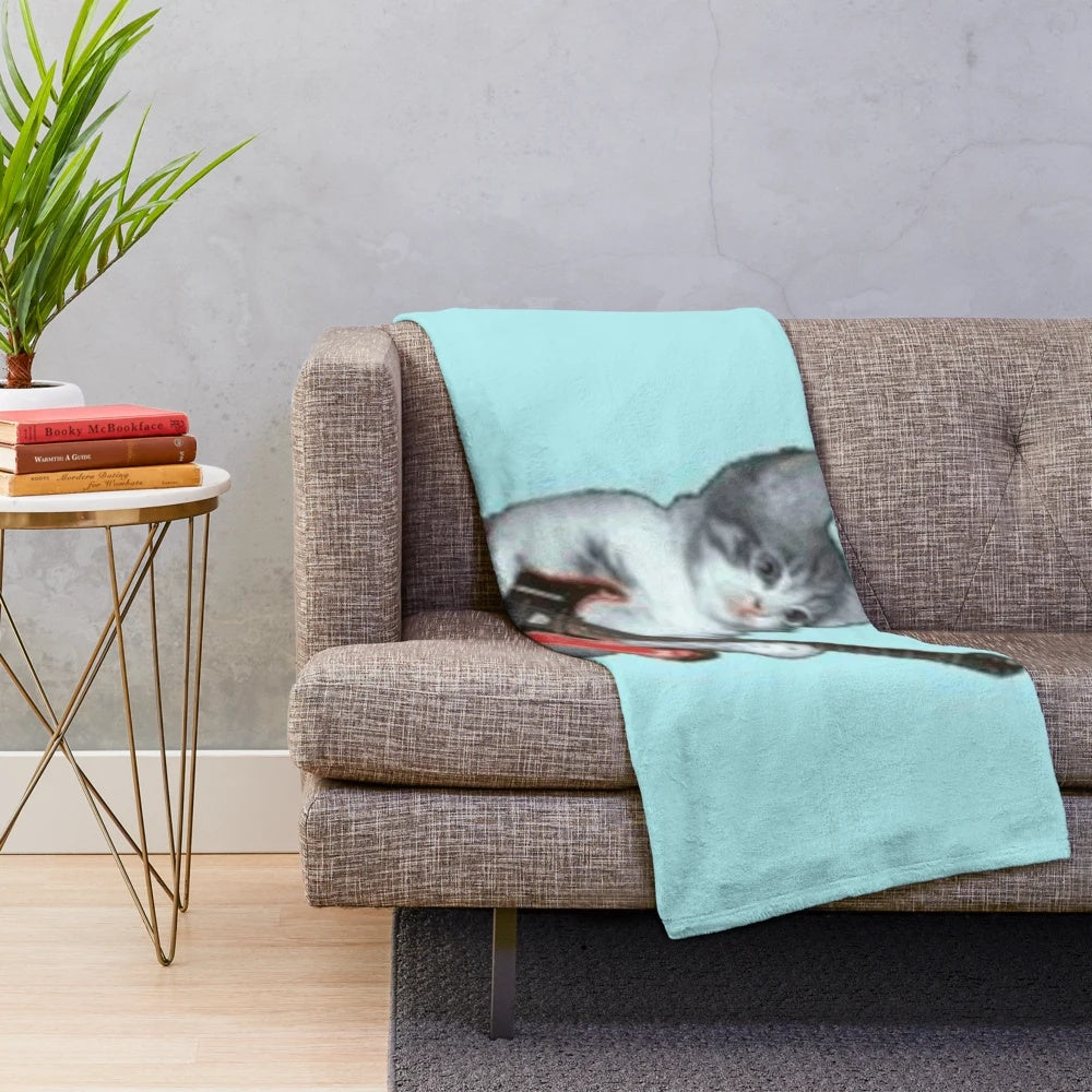 Soft and cozy plush blanket with a funny cat design