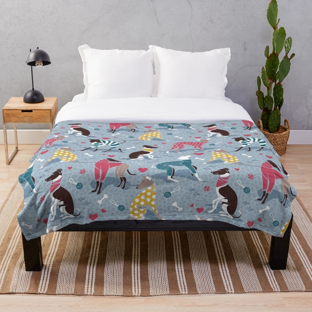 Greyhounds dog illustration on a pale blue plush blanket