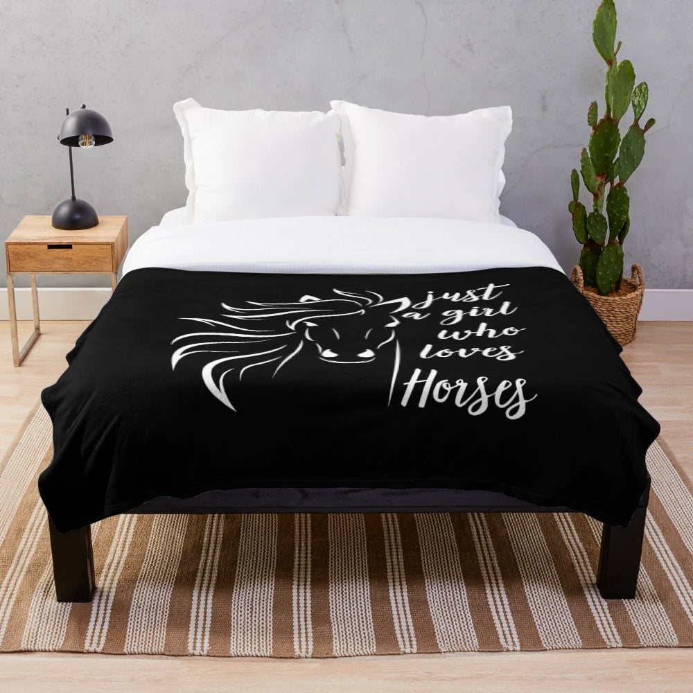 Soft plush blanket featuring a "Just a girl who loves horses" design for equestrian enthusiasts