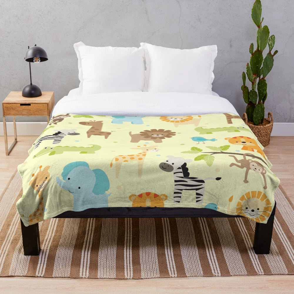 Plush jungle animals blanket featuring elephant, giraffe, and other wildlife