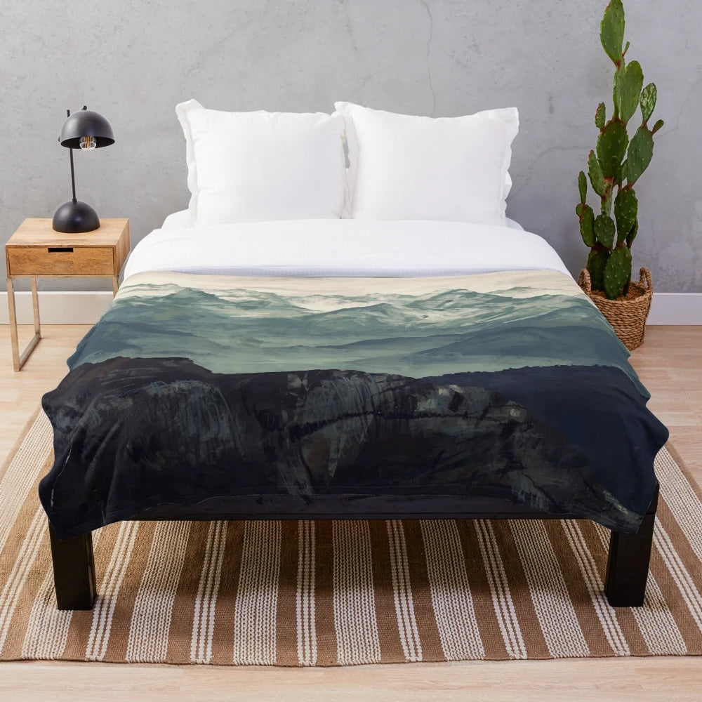 Plush mountain-themed blanket with calming landscape design