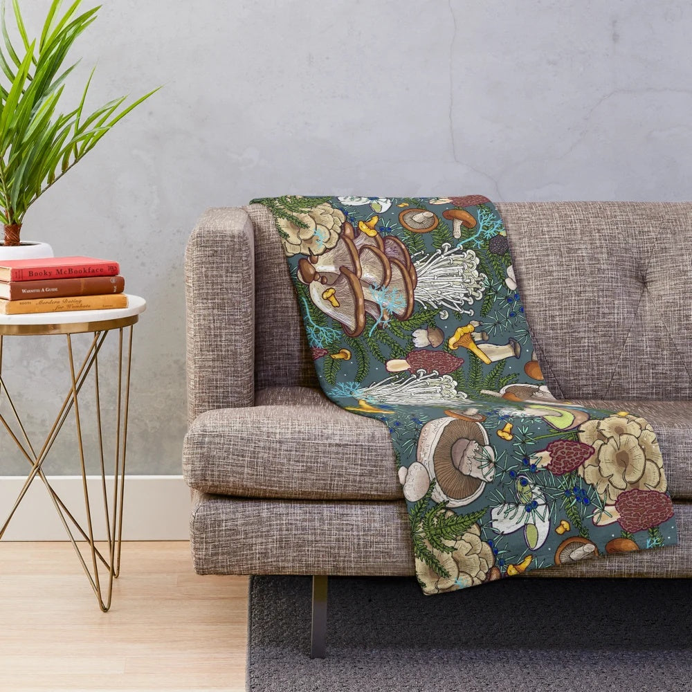 Soft and plush blanket with a botanical mushroom forest pattern