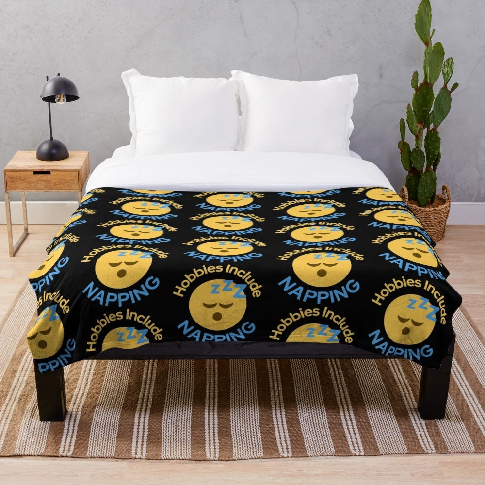 Cozy plush nap blanket with sleeping emoji design