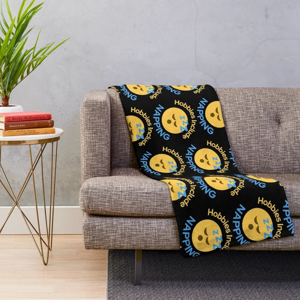 Cozy plush nap blanket with sleeping emoji design