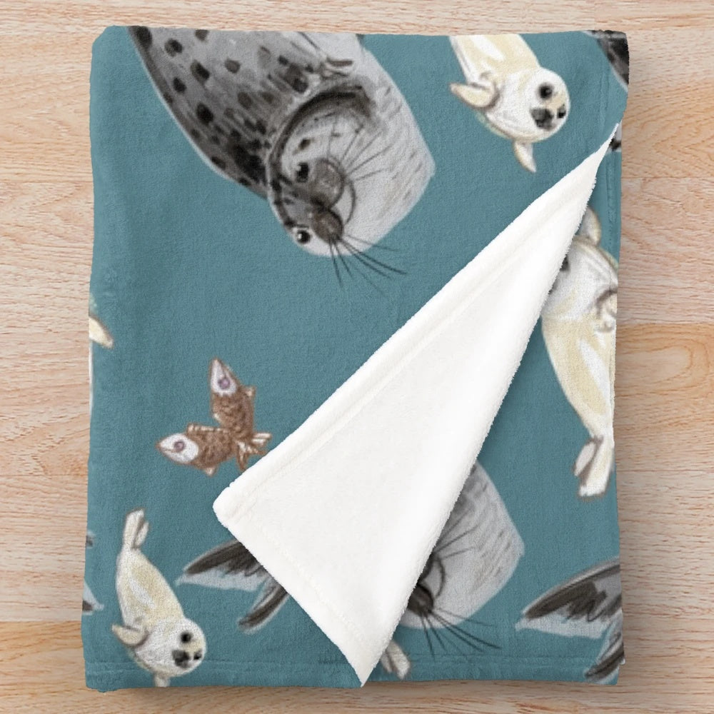 Soft, snuggly plush seal blanket perfect for cuddling