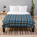 Cozy plush tartan blanket featuring the Thomson clan tartan pattern