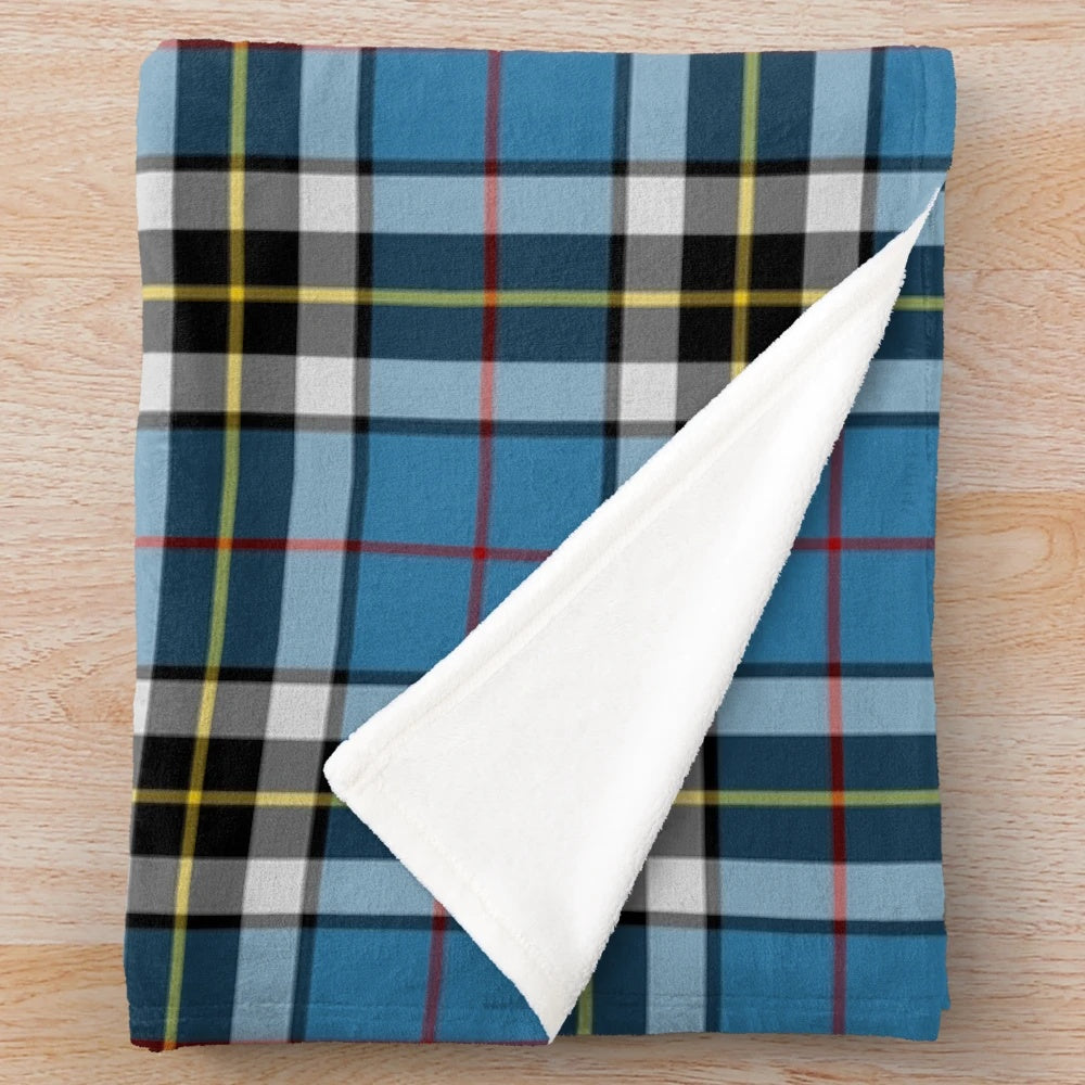 Cozy plush tartan blanket featuring the Thomson clan tartan pattern