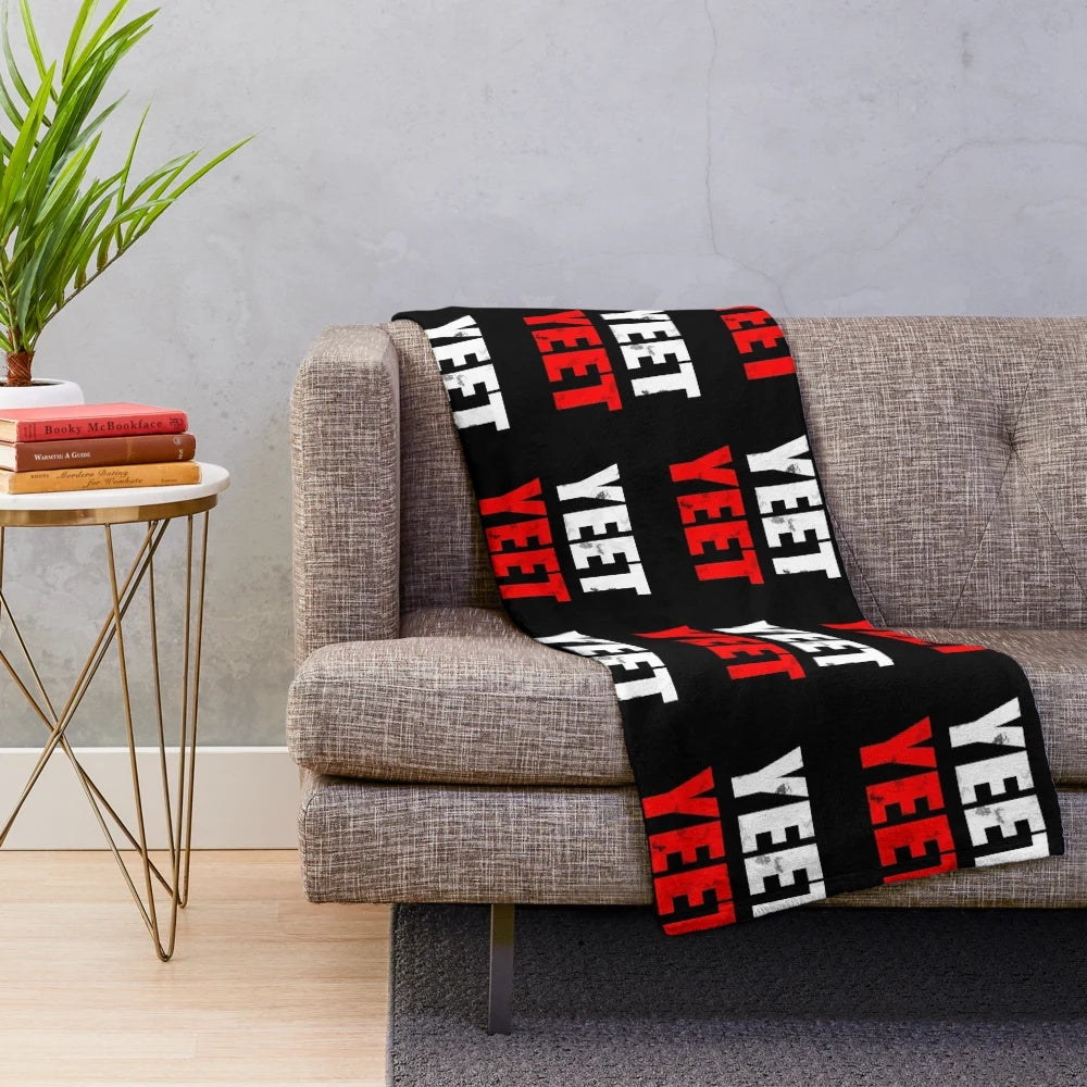 Plush yeet blanket with a distressed, vintage-inspired design