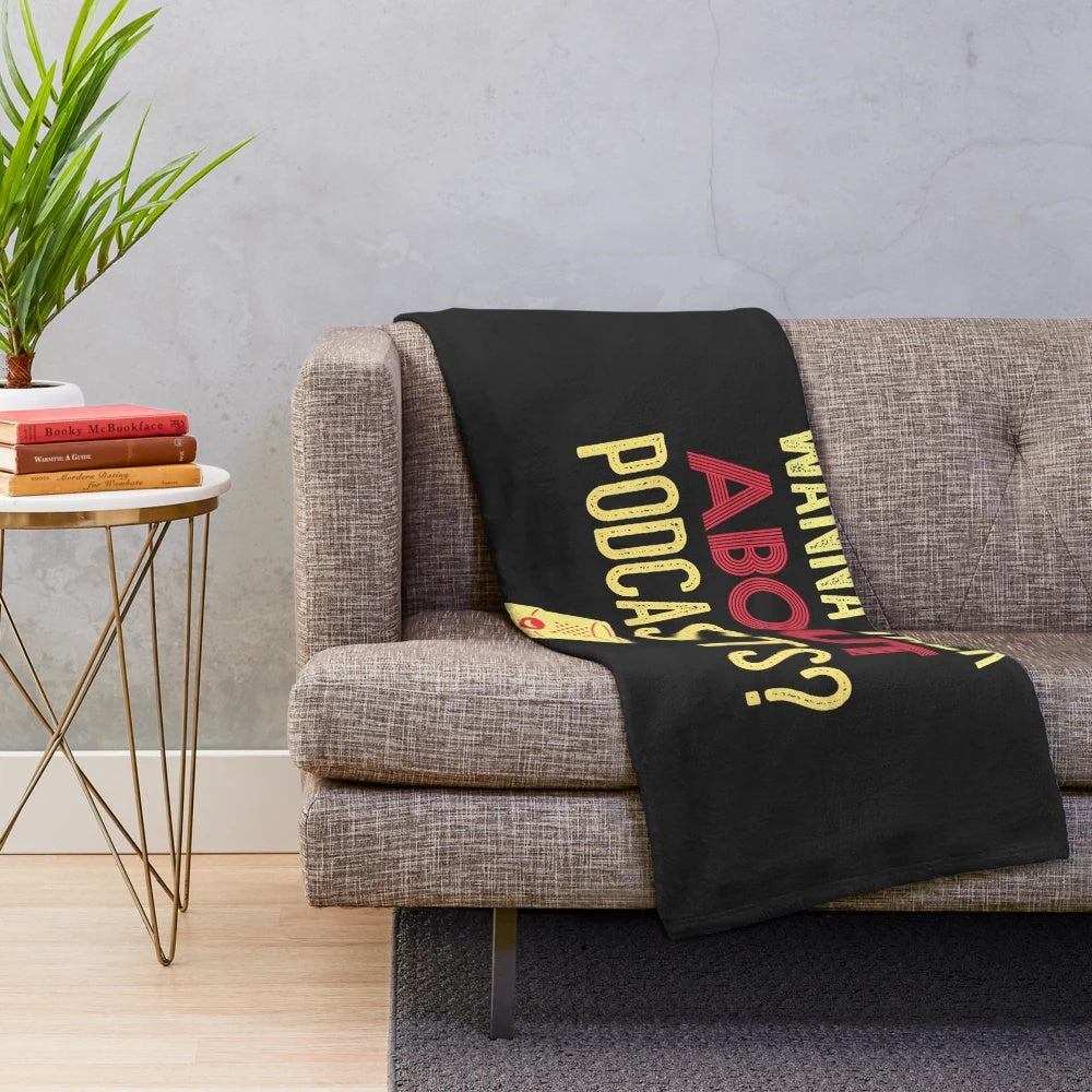 A soft and cozy plush blanket featuring a handlettered "Wanna Talk About Podcasts" design, perfect for true crime podcast fans.