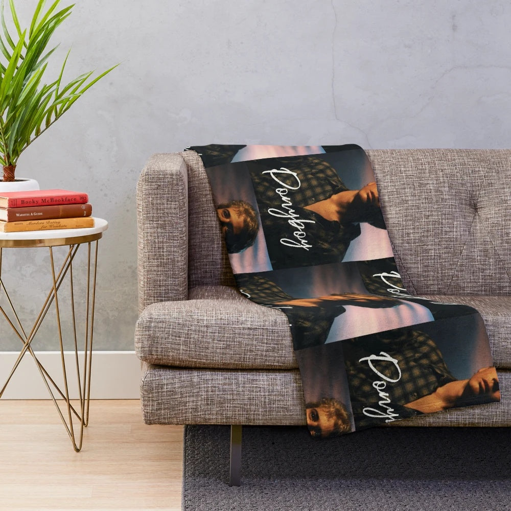 Ponyboy Curtis from The Outsiders movie on a plush blanket