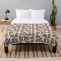 Soft and cuddly plush blanket featuring a playful toy poodle pattern