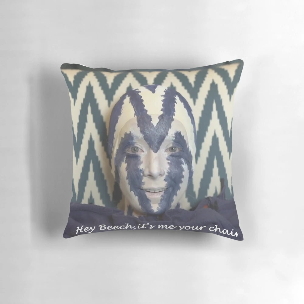 A cozy and comfortable chair pillow featuring a humorous Jenna Marbles-inspired design.