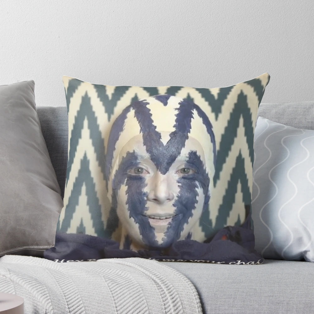 A cozy and comfortable chair pillow featuring a humorous Jenna Marbles-inspired design.