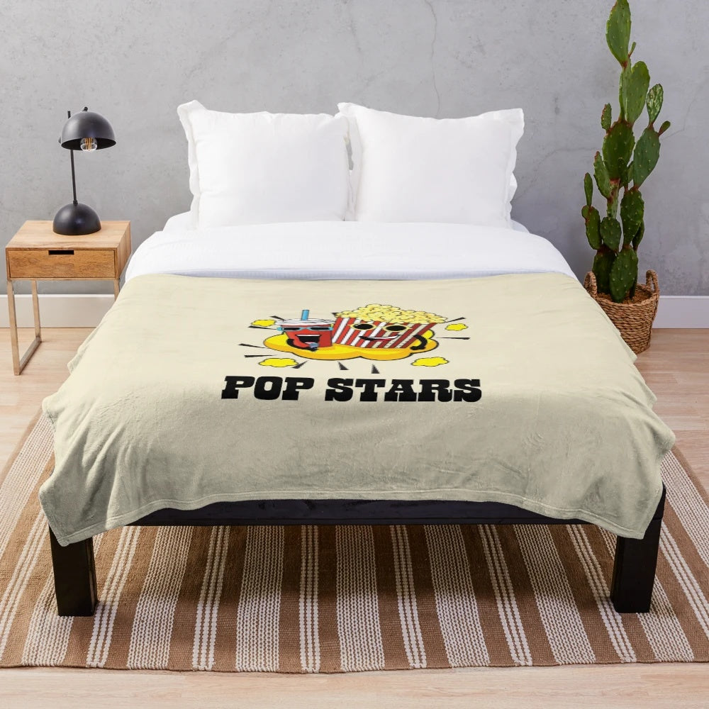 Pop culture inspired plush blanket with soda and popcorn design