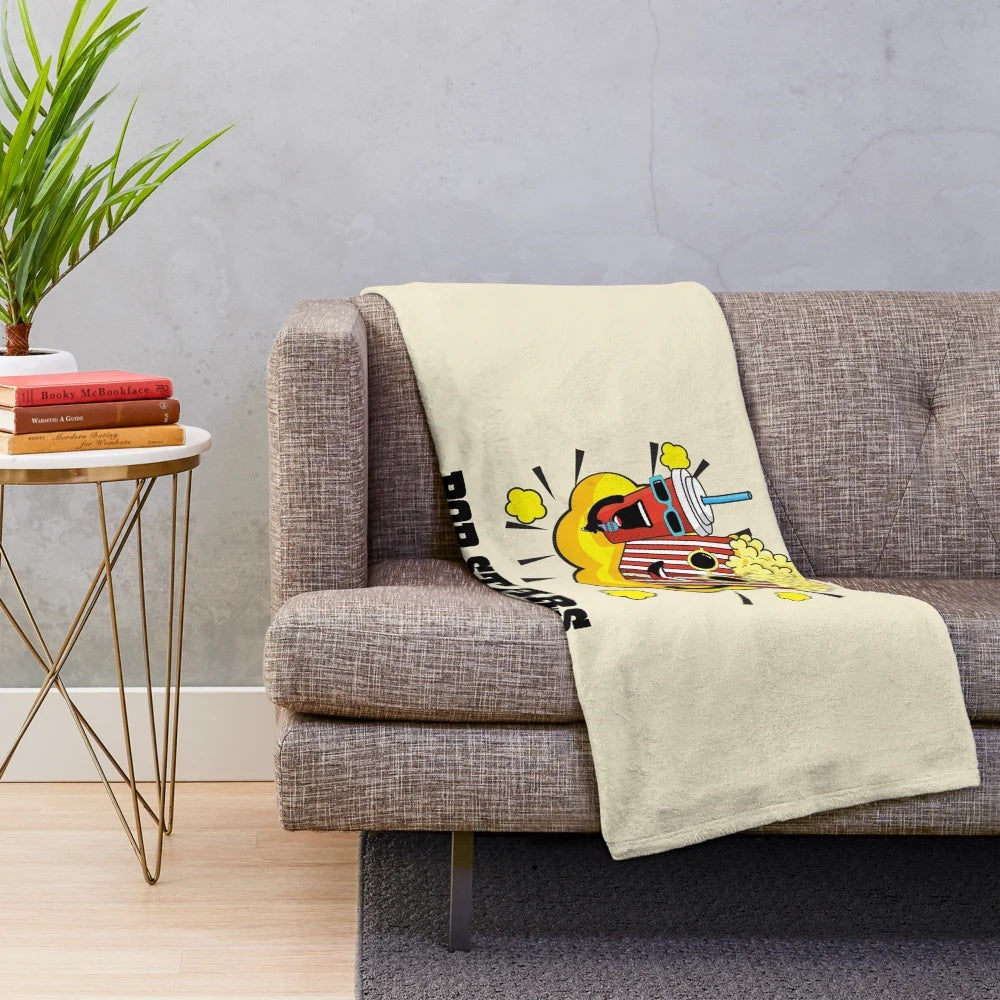 Pop culture inspired plush blanket with soda and popcorn design