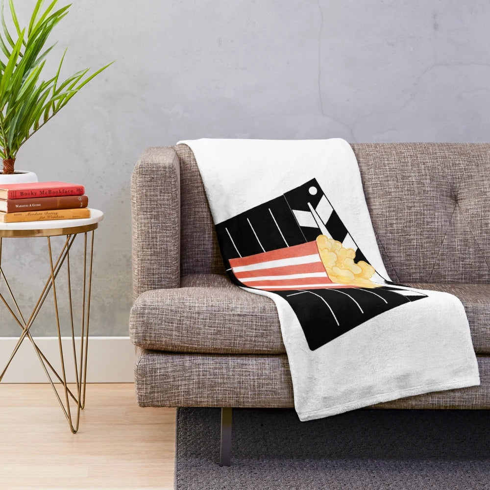 Popcorn cinema-themed plush blanket for cozy movie viewing