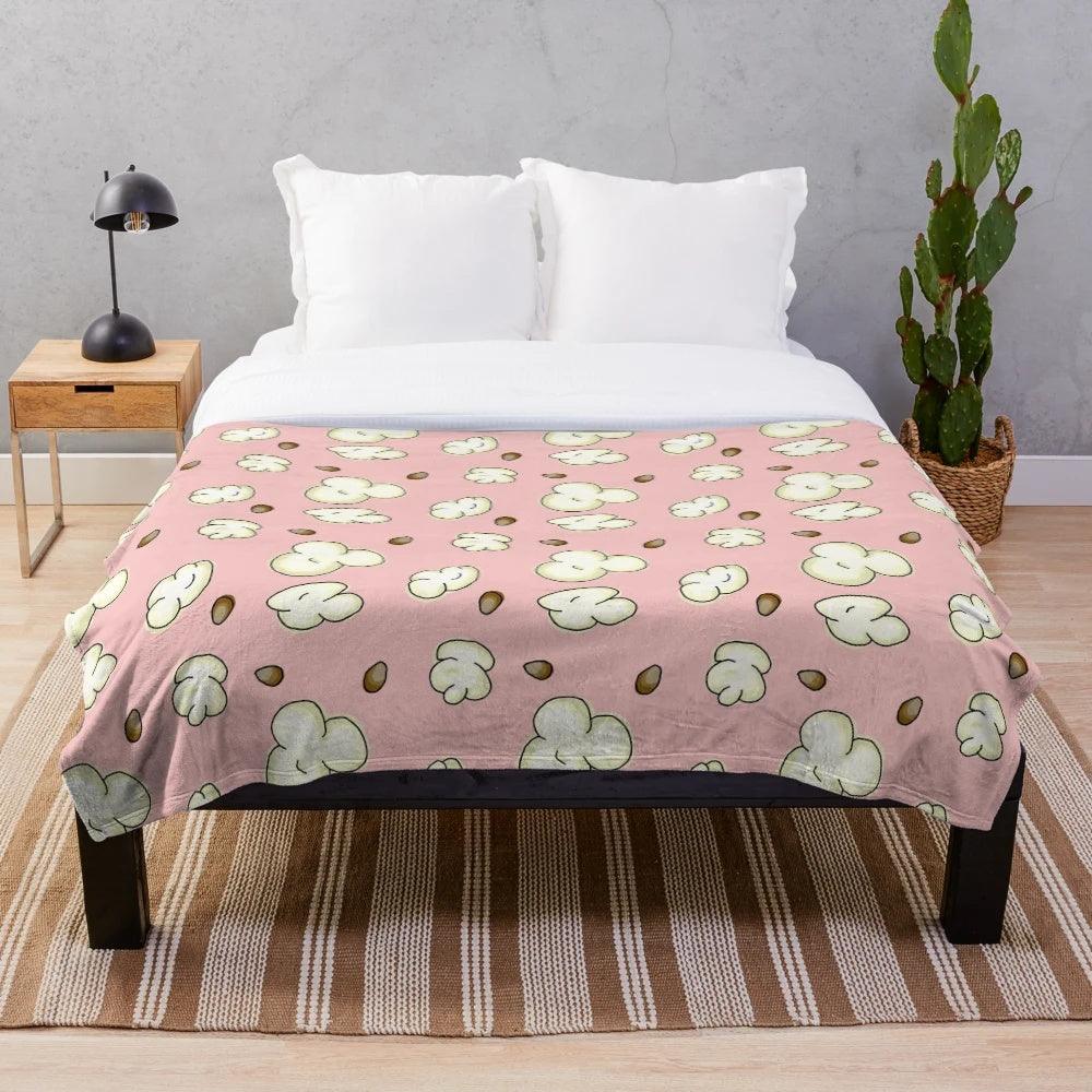 Soft and plush popcorn-themed blanket perfect for movie nights