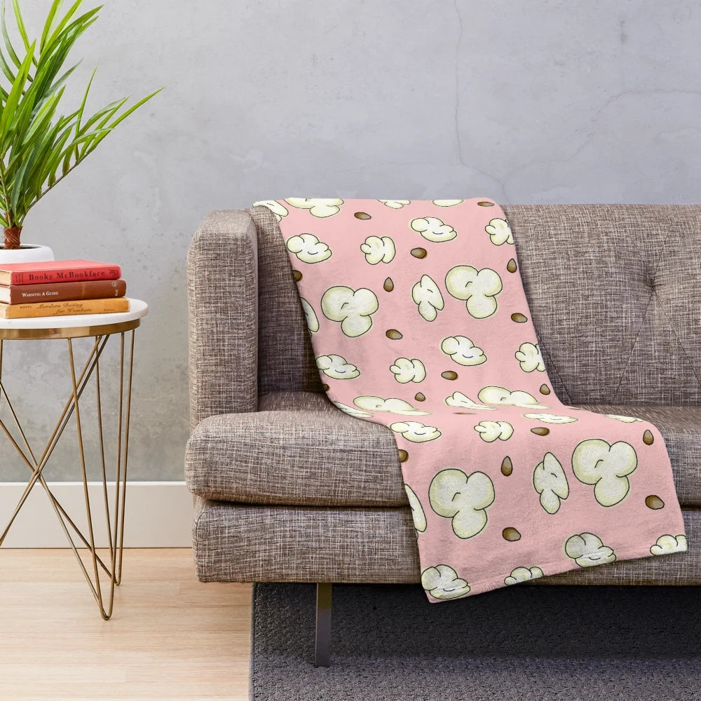 Soft and plush popcorn-themed blanket perfect for movie nights