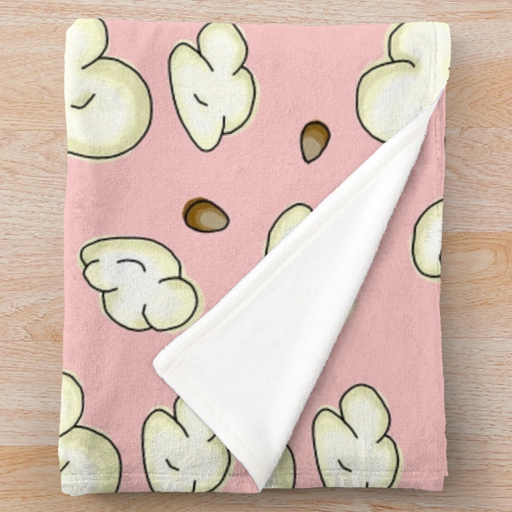 Soft and plush popcorn-themed blanket perfect for movie nights