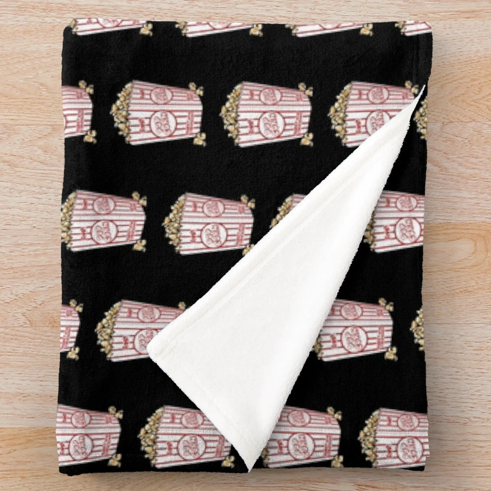 Popcorn-themed plush blanket with red and white stripes, perfect for movie nights and home decor
