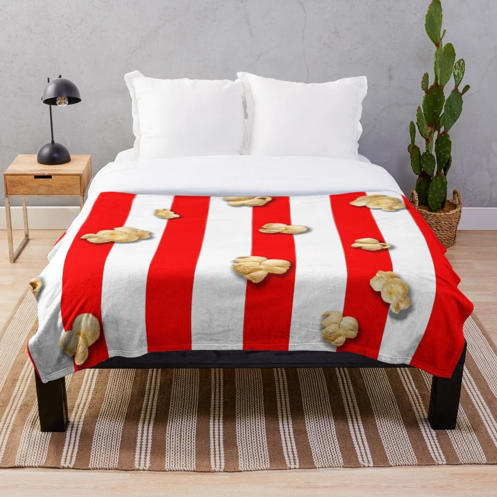 Popcorn-patterned plush blanket perfect for movie nights and snuggling