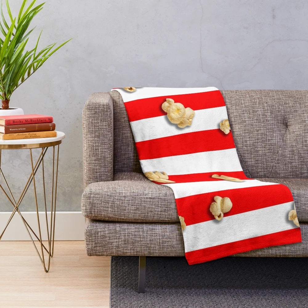 Popcorn-patterned plush blanket perfect for movie nights and snuggling