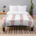 Plush popcorn-themed blanket for cozy movie nights