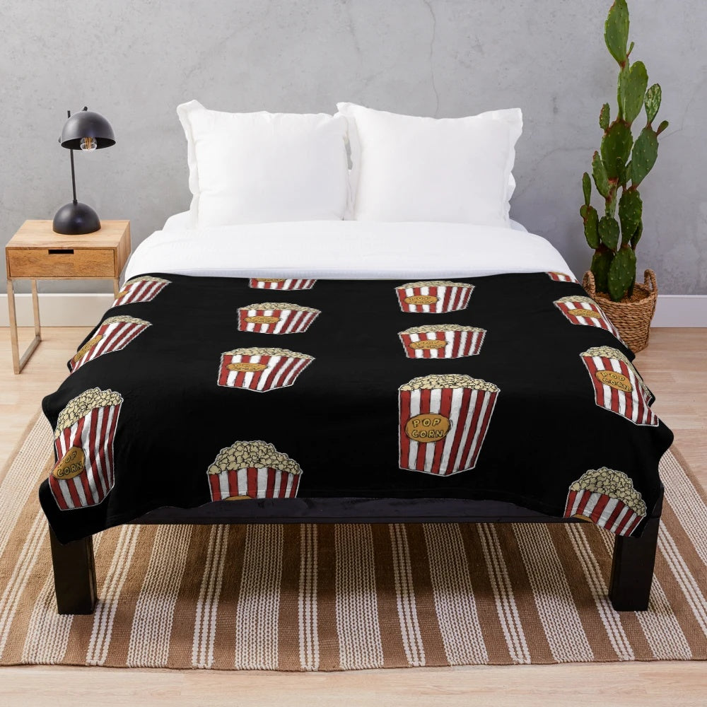 Soft, plush popcorn-themed blanket for cozy movie nights