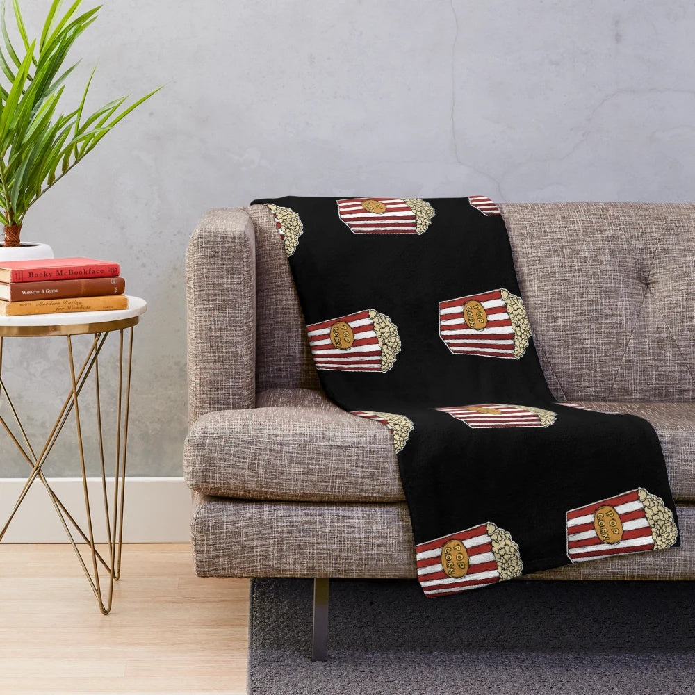 Soft, plush popcorn-themed blanket for cozy movie nights