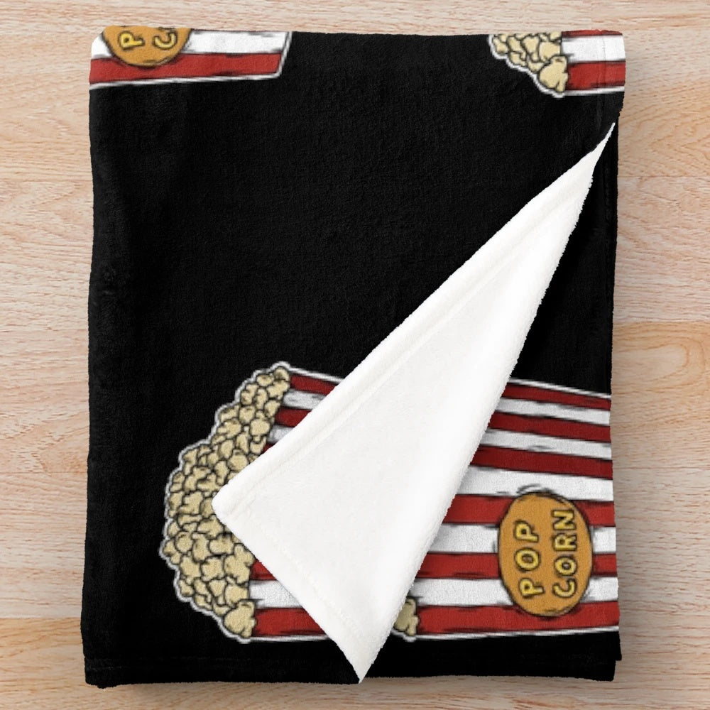 Soft, plush popcorn-themed blanket for cozy movie nights