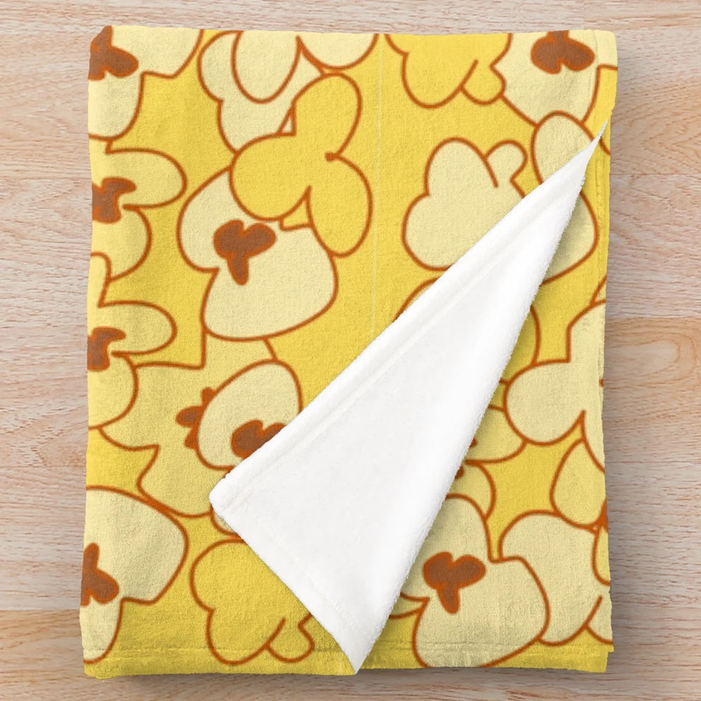 Popcorn-themed plush blanket perfect for movie lovers